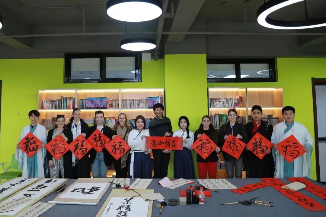 Chinese calligraphy workshop with students at Harbin