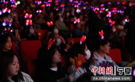 Packed audience with glow sticks at Yinchuan